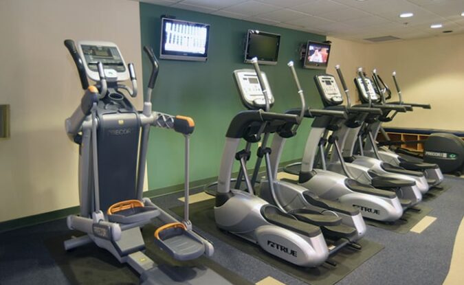 treadmills lined up next to each other in Park Place gym