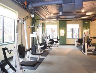 Weight lifting equipment in Park Place fitness center
