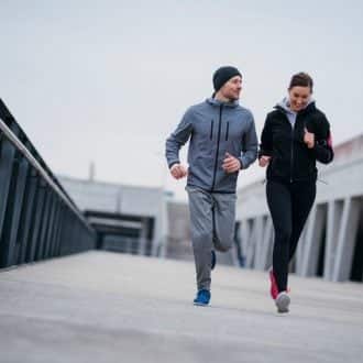 couple running in winter